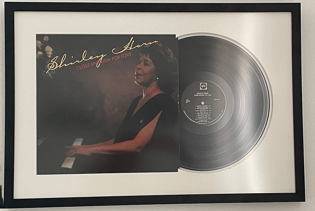 an lp from iconic jazz artist shirley horn, framed